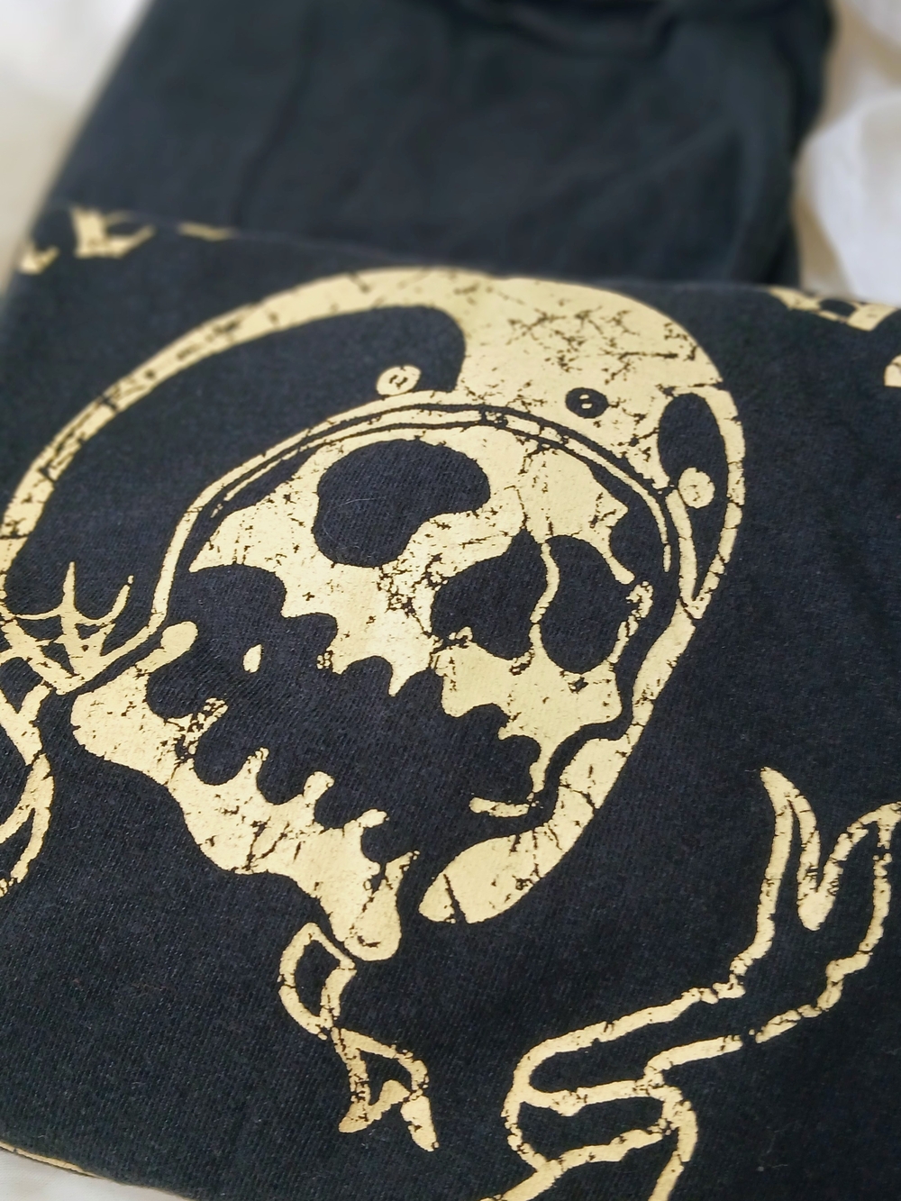 Black Tee with Distressed Cream Skull Graphic